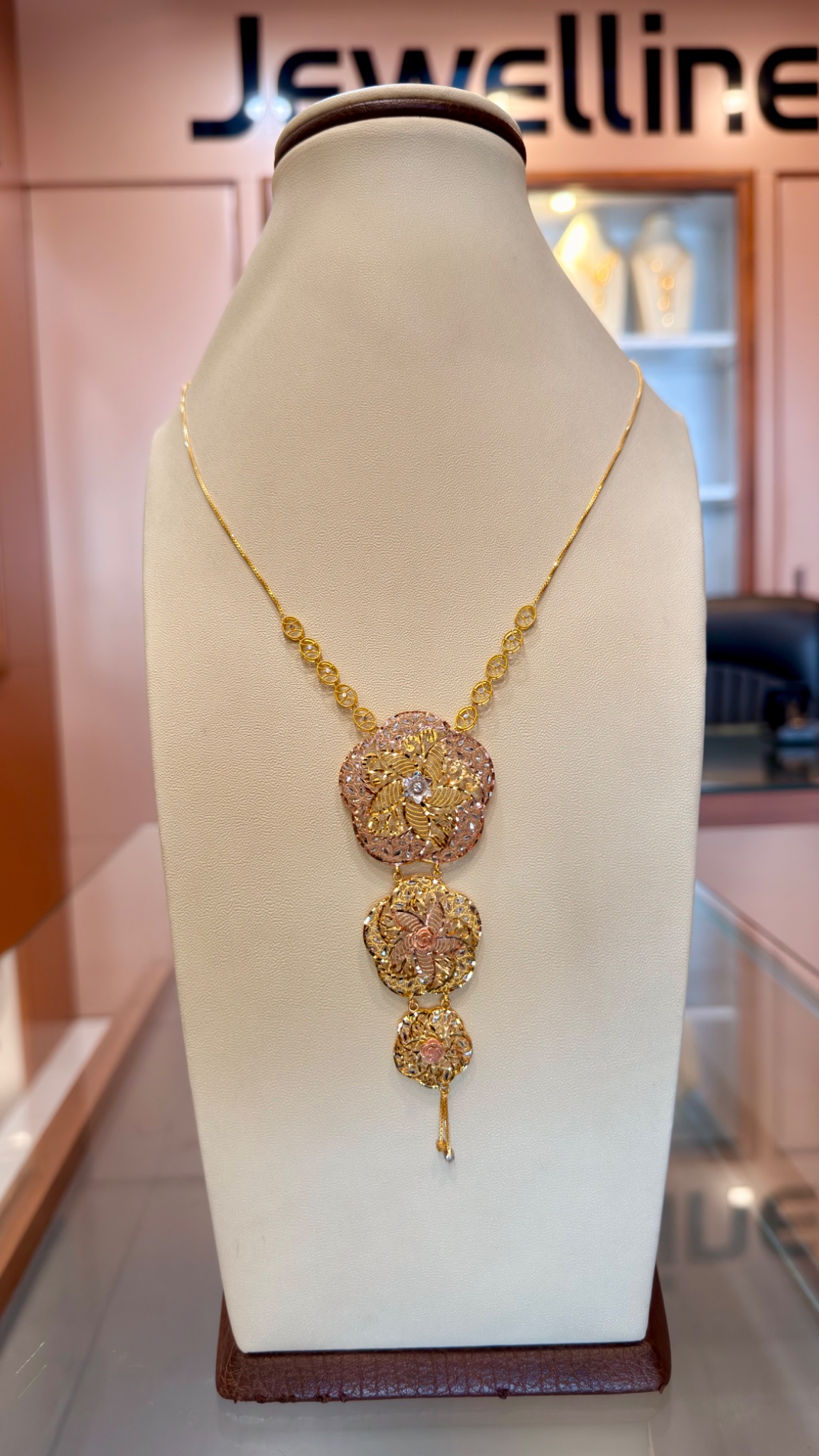 Elegant Three-Tier Filigree Floral Drop Necklace in Tri-Tone Gold - Image 3