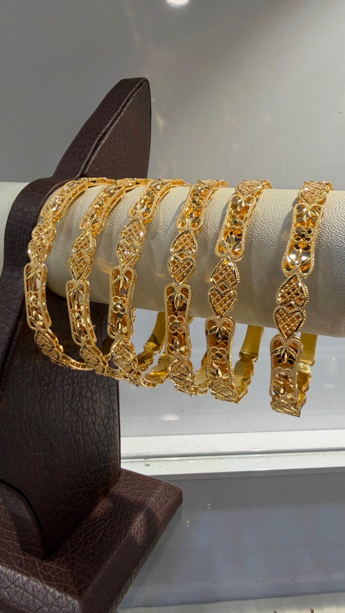 Exquisite Handcrafted Gold Bangle Set with Heart and Floral Motifs - Image 2
