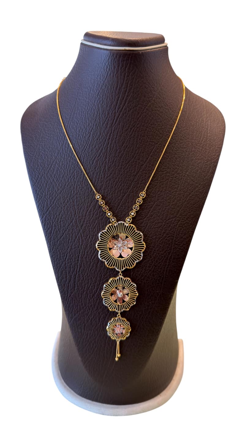 Three-Tier Floral Radiance Tri-Tone Gold Pendant Necklace